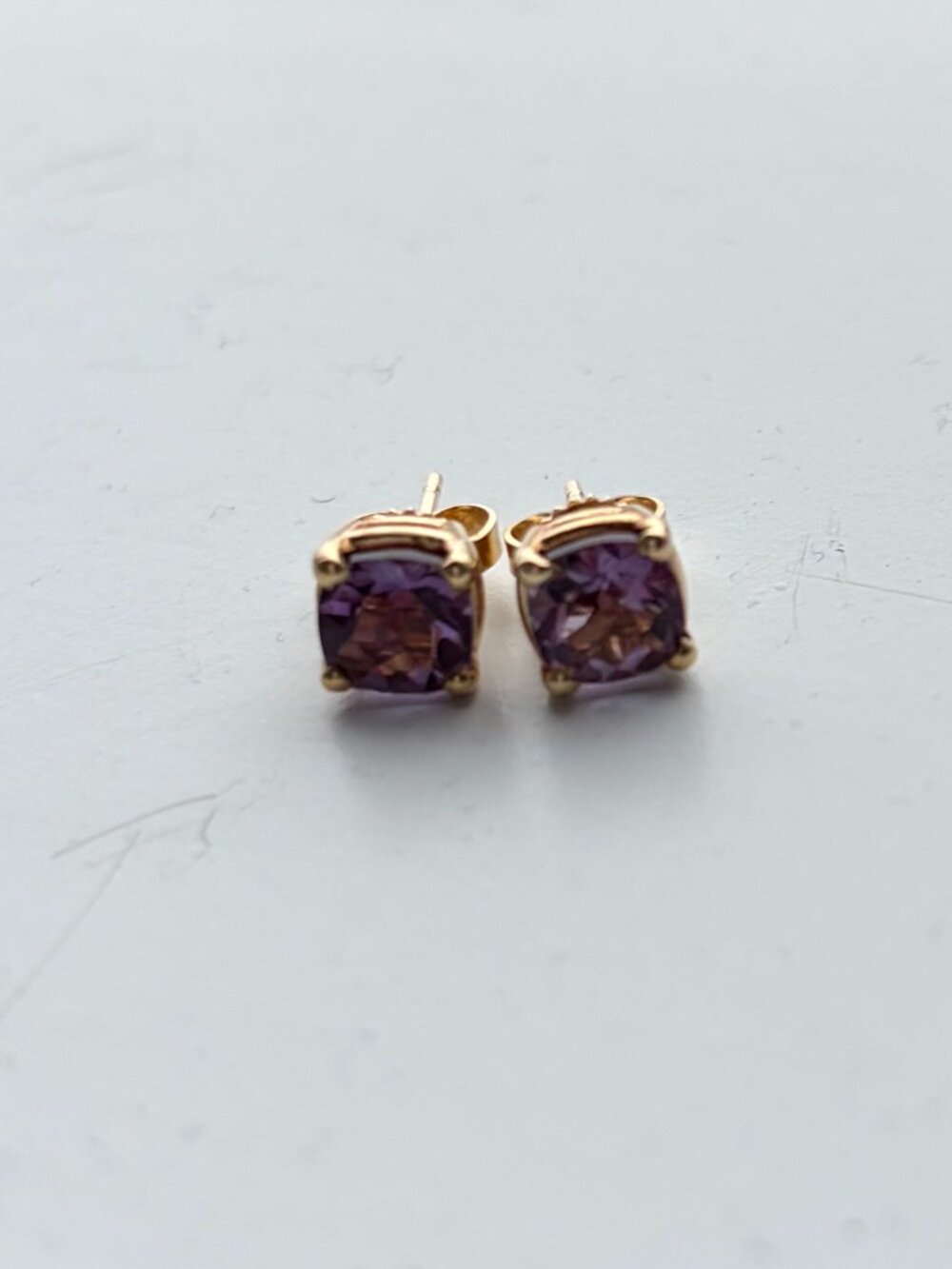 Jane Pope cusion cut amethyst studs